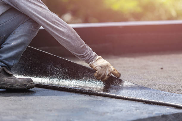 Professional Basement Waterproofing technician working in Clare, MI